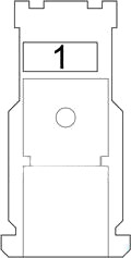 Detail bloku pojistek v interiéru vozidla, pod přístrojovou deskou.