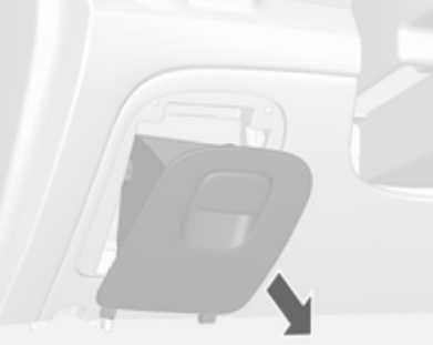Detailní pohled na pojistky za přístrojovou deskou po odstranění zásuvky.