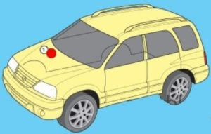 Detailní pohled na pojistkovou skříňku umístěnou pod kapotou vozidla.